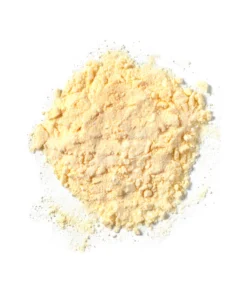 Loose pile of pale yellow powder on a white background.