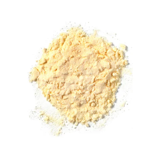 Loose pile of pale yellow powder on a white background.