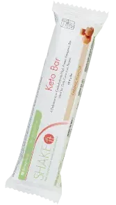 Package of a keto shake bar featuring apple and cinnamon flavor with added fiber and protein.