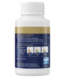 Back label of a white supplement bottle with gold and navy design, listing active ingredients as concentrated fish omega-3 triglycerides with DHA 500mg and EPA 100mg; includes quality assurance data on mercury, p-anisidine, and peroxide levels, made in Australia by BioCeuticals division of Blackmores Ltd with contact information and a GOED Omega-3 membership logo.