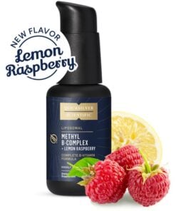 Black bottle of Quicksilver Scientific liposomal Methyl B-Complex dietary supplement in lemon raspberry flavor, accompanied by fresh raspberries and a lemon slice.