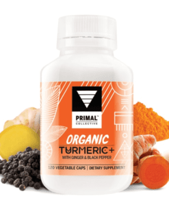 Bottle of Primal Collective Organic Turmeric+ dietary supplement with ginger and black pepper, surrounded by turmeric root, ginger, black peppercorns, and turmeric powder.