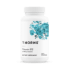 Bottle of Thorne Vitamin B12 dietary supplement containing 60 capsules with blue abstract design on the label.